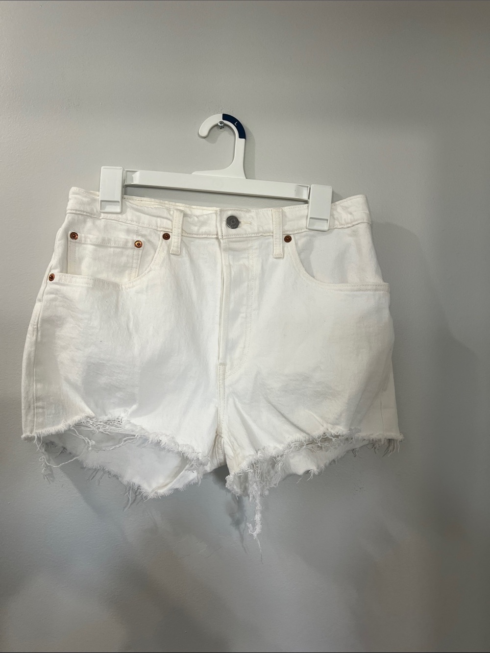 Levi 501 High-Rise White Denim Cutoff Shorts with Frayed Hem